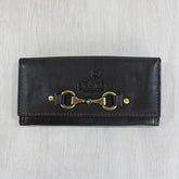 A brown leather purse with a metallic bit closure, displayed against a white background.